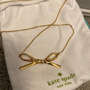 Brand new, never worn! Kate Spade gold bow necklace.